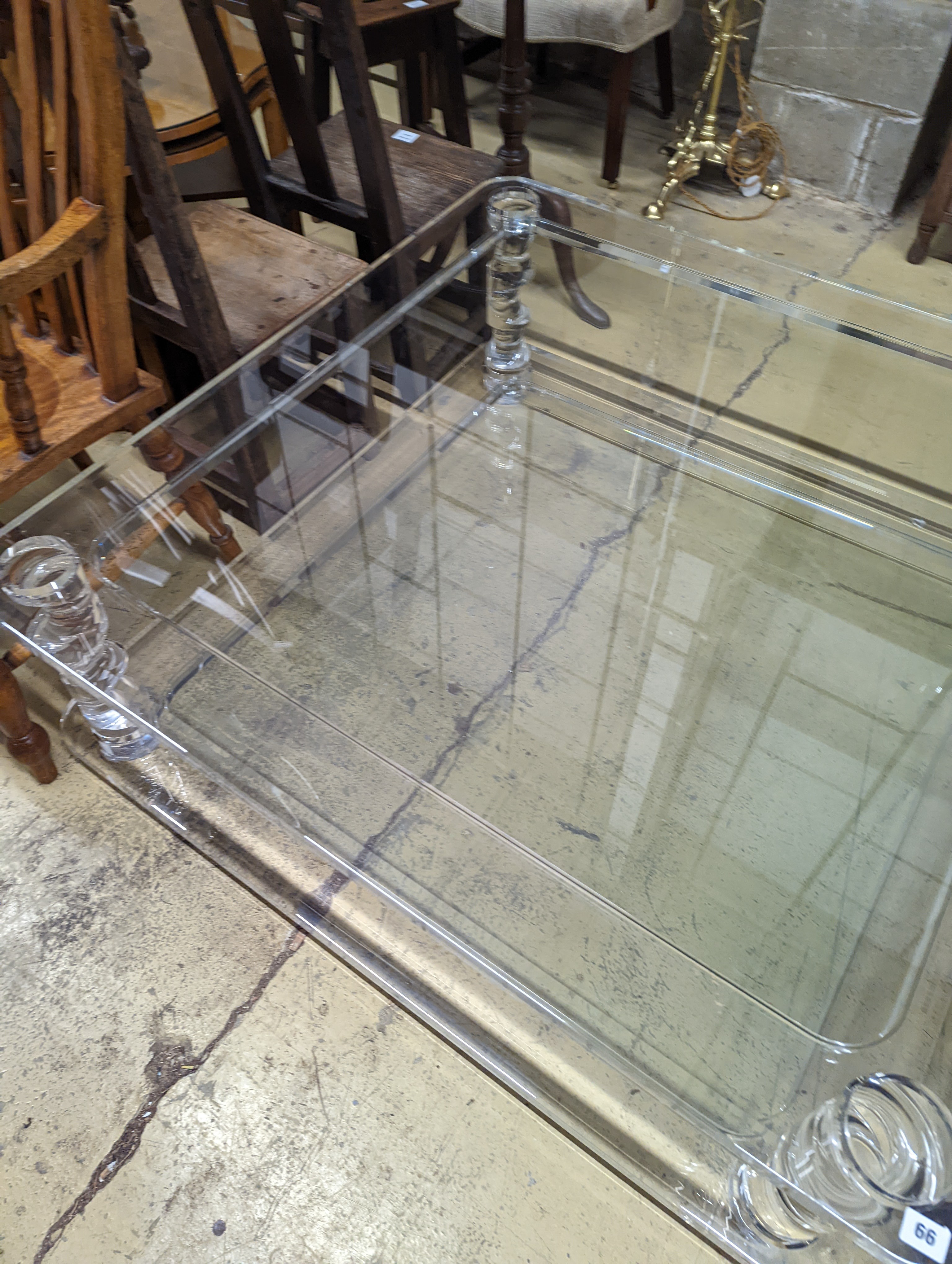 A contemporary perspex and glass square two tier coffee table, width 120cm, height 40cm